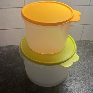 Brand new never used Round Tupperware containers with tight fitting lids